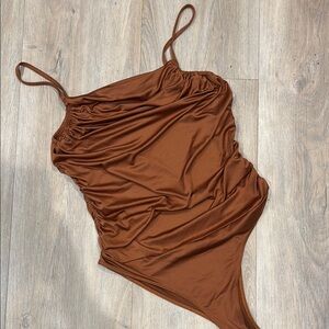 AND NOW THIS RUCHED SIDES TANK BODYSUIT